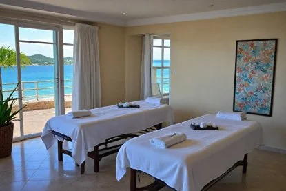 two massage tables side by side in living quarters at airbnb in st maarten for mobile spa massage 