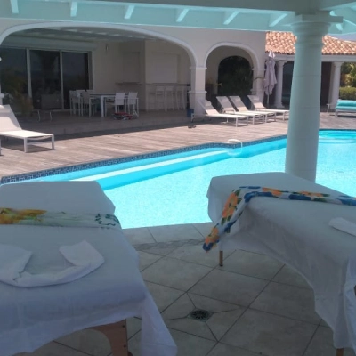 two massage table by pool - setup by st maarten massage mobile